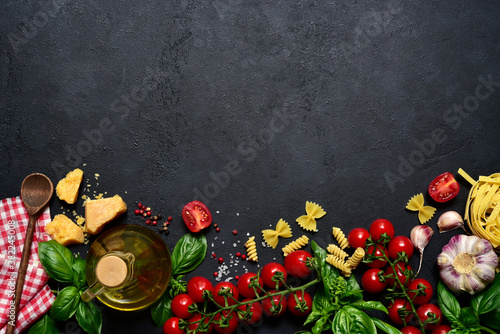 Culinary background with traditional ingredients of italian cuisine. Top view with copy space.