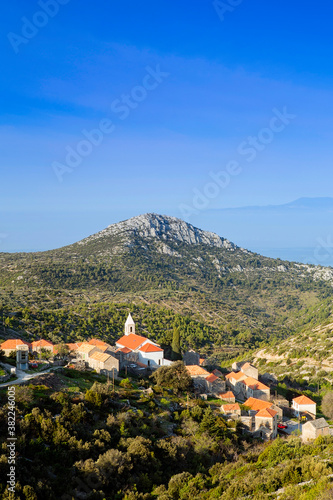 Velo Grablje village and mountains against the Adriatic Sea, Hvar Island, Dalmatia, Croatia photo