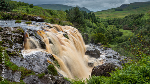 The Loup of Fintry waterfall on the River Endrick, located approximately two miles from Fintry village, near Stirling, Scotland photo