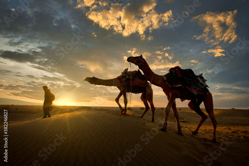 A camel trader in the famous Sam Sand dunes in Jaisalmer region of Rajasthan state, India