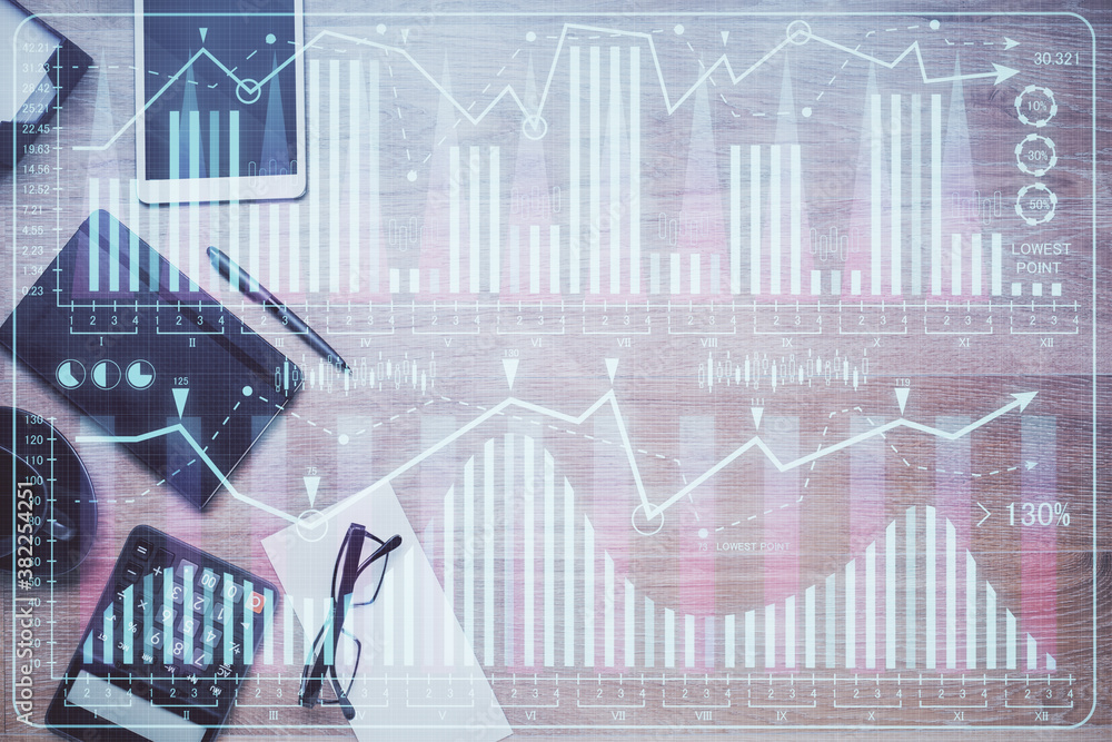 Double exposure of forex graph drawing and work table top veiw. Concept of financial analysis. Double exposure of forex graph drawing and work table top veiw. Concept of financial analysis.