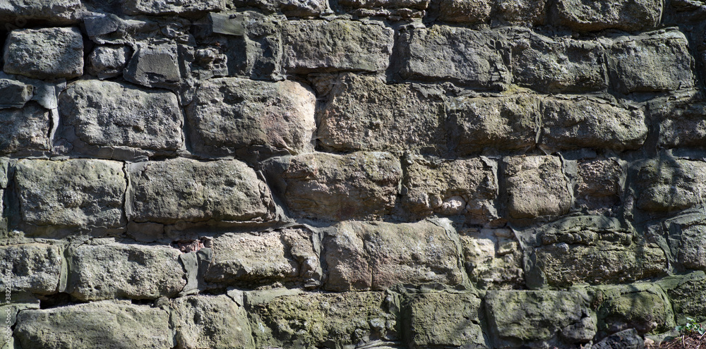 the texture of the old wall from stones as background the texture of the old wall from stones as background