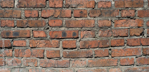 the texture of the old wall from red bricks as background