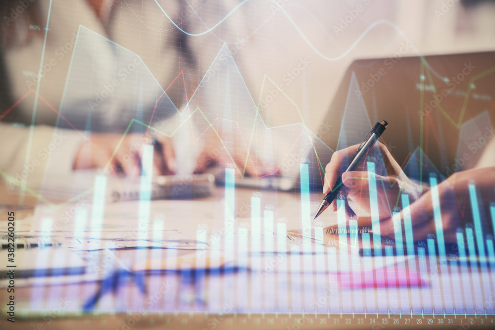 Multi exposure of woman hands typing on computer and forex chart hologram drawing. Stock market analysis concept. Multi exposure of woman hands typing on computer and forex chart hologram drawing. Stock market analysis concept.