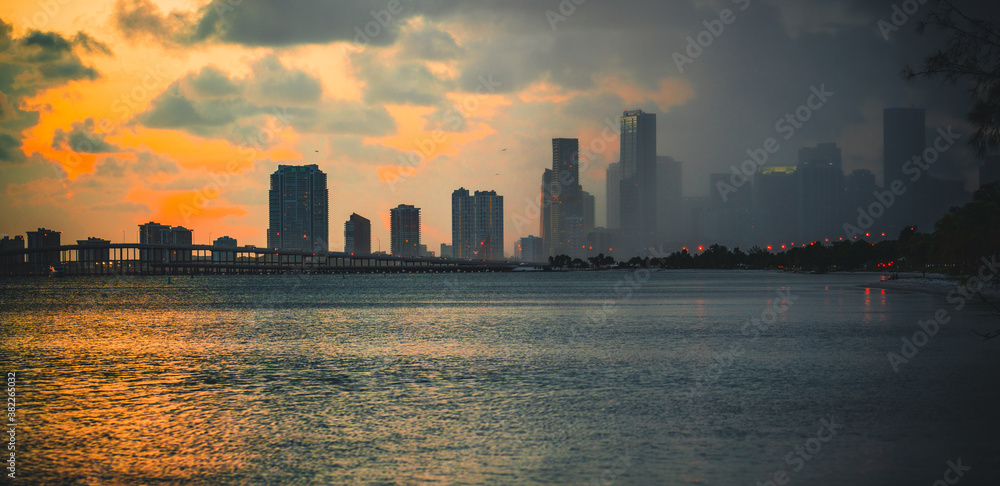 city skyline at sunset rain sea miami florida buildings 