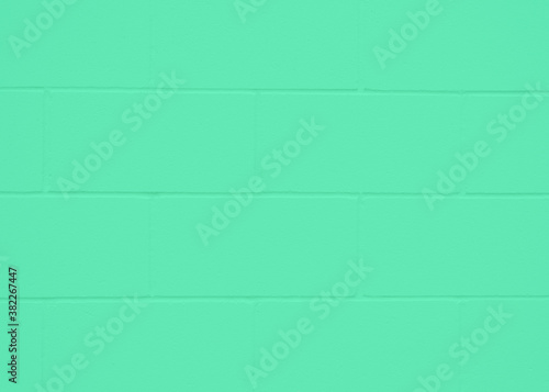 Light green cinder block wall background