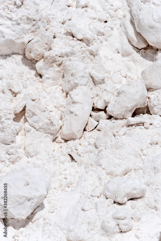 Piles of salt drying on a salt flat Piles of salt drying on a salt flat