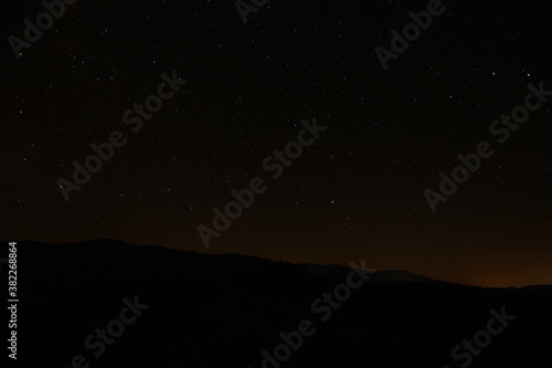 night sky stars with milky way on mountain background