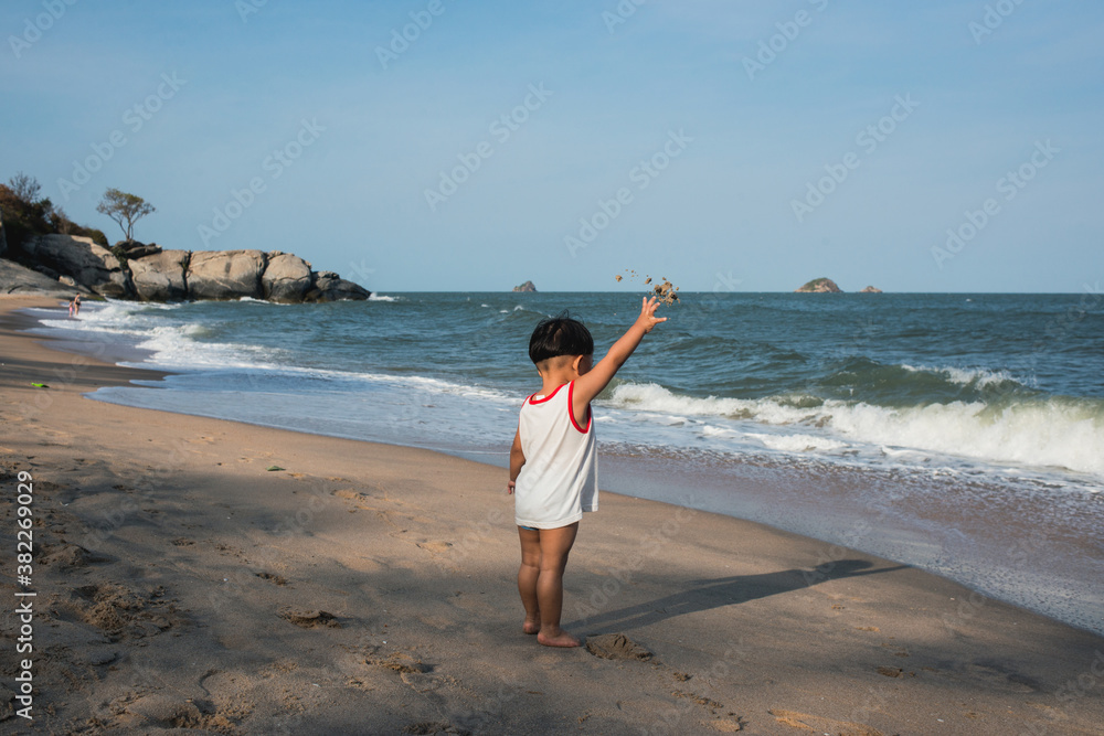 Asian boy on the beach