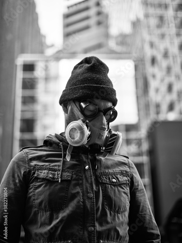 Man Wearing Respirator Mask in Empty City