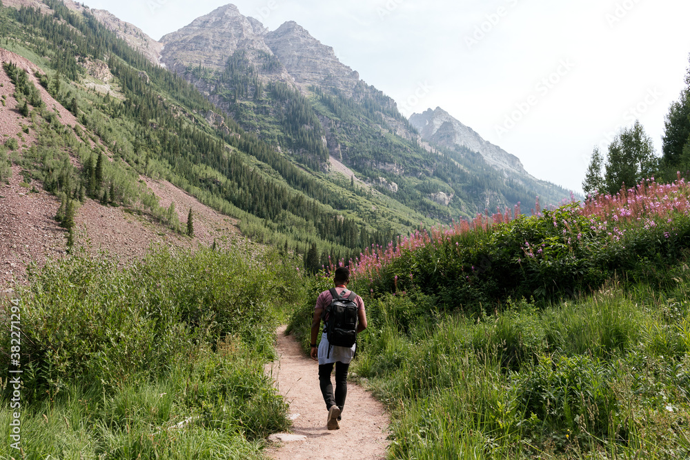 A man hiking Maroon Bells, Colorado A man hiking Maroon Bells, Colorado
