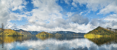 Wallpaper Mural Reflection in the water of the mountains and sky. The calm flow of the Yenisei River in Siberia. Autumn. Torontodigital.ca