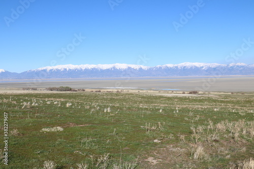 Antelope Island  Great Salt Lake and snowcapped Wasatch mountains  Utah