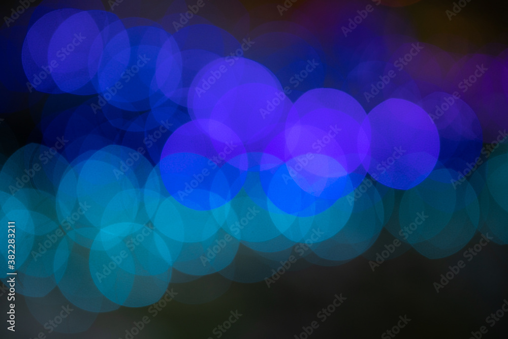 abstract blue background with bokeh. Christmas balls of light abstract blue background with bokeh. Christmas balls of light