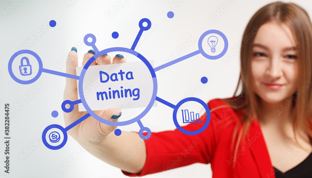 Business, Technology, Internet and network concept. Young businessman working on a virtual screen of the future and sees the inscription: Data mining Business, Technology, Internet and network concept. Young businessman working on a virtual screen of the future and sees the inscription: Data mining