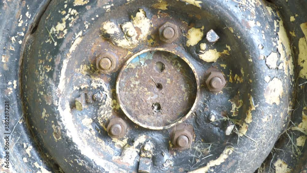 Closer look of the old and rusty tire of the truck Closer look of the old and rusty tire of the truck