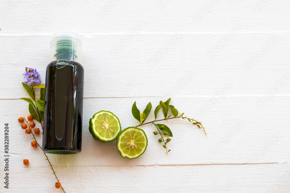 herbal shampoo extract vegetation kaffir lime flora of asia health care for wash hairs of lifestyle cleaning arrangement flat lay style on background white wooden herbal shampoo extract vegetation kaffir lime flora of asia health care for wash hairs of lifestyle cleaning arrangement flat lay style on background white wooden