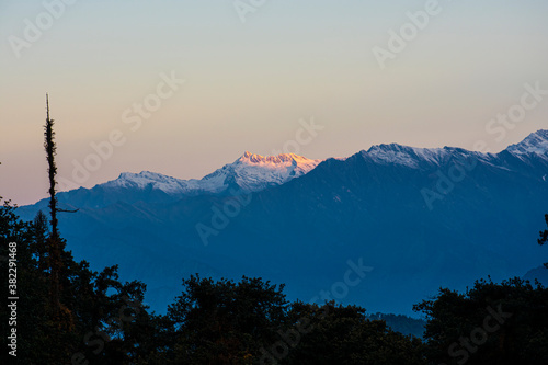 view of kedarnath peak and other peaks from chopta valley of uttarakhand in a october morning photo