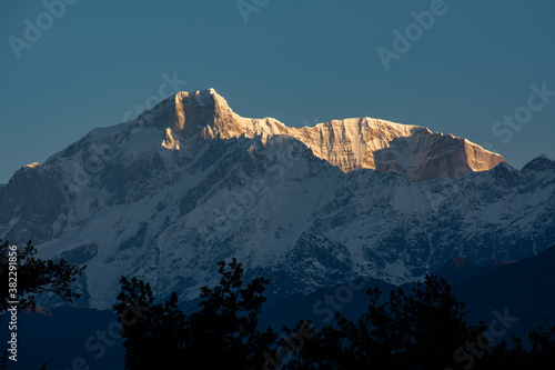 view of kedarnath peak and other peaks from chopta valley of uttarakhand in a october morning photo