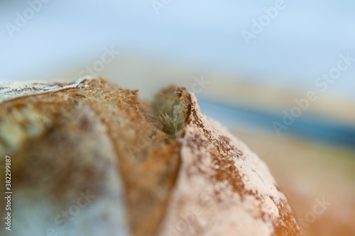 Detail of a crack in the crust of a homemade sourdough bread