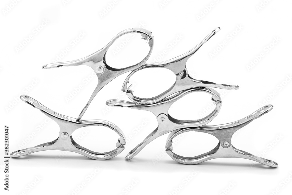 The stainless steel clamp is placed on a white background.