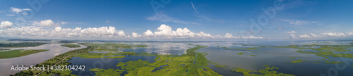 Aerial view panorama of Magdalena River landscape  Colombia with blue sky and white clouds on a sunny day