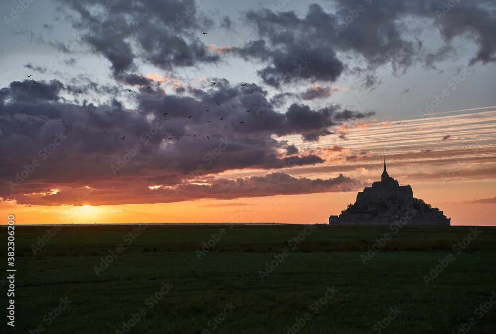 Beautiful sunset with clouds at Mont saint-Michel