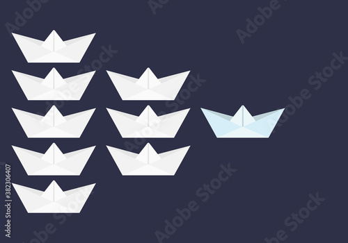 Barco de papel azul al frente de barcos de papel blancos.