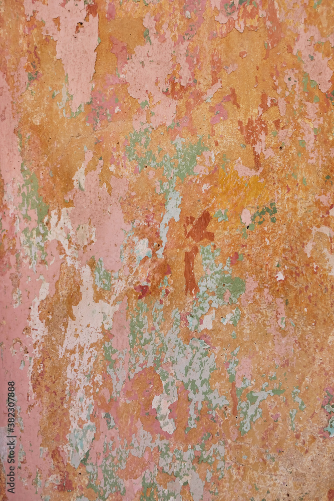 Pink, orange and red pattern on a wall Pink, orange and red pattern on a wall