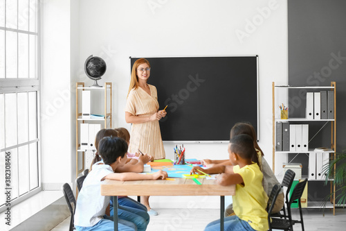 Teacher conducting lesson i...