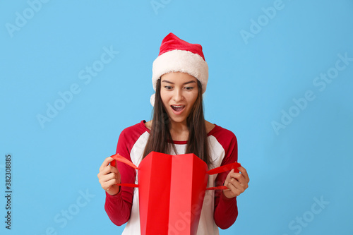 Surprised young woman in Sa...