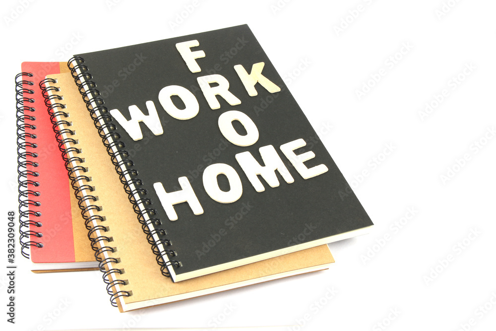 Words work from home made of wooden blocks, concept of self quarantine stay at home Words work from home made of wooden blocks, concept of self quarantine stay at home