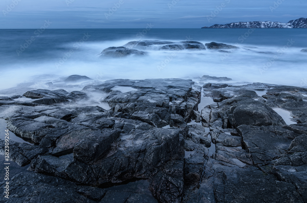 waves crashing on rocks