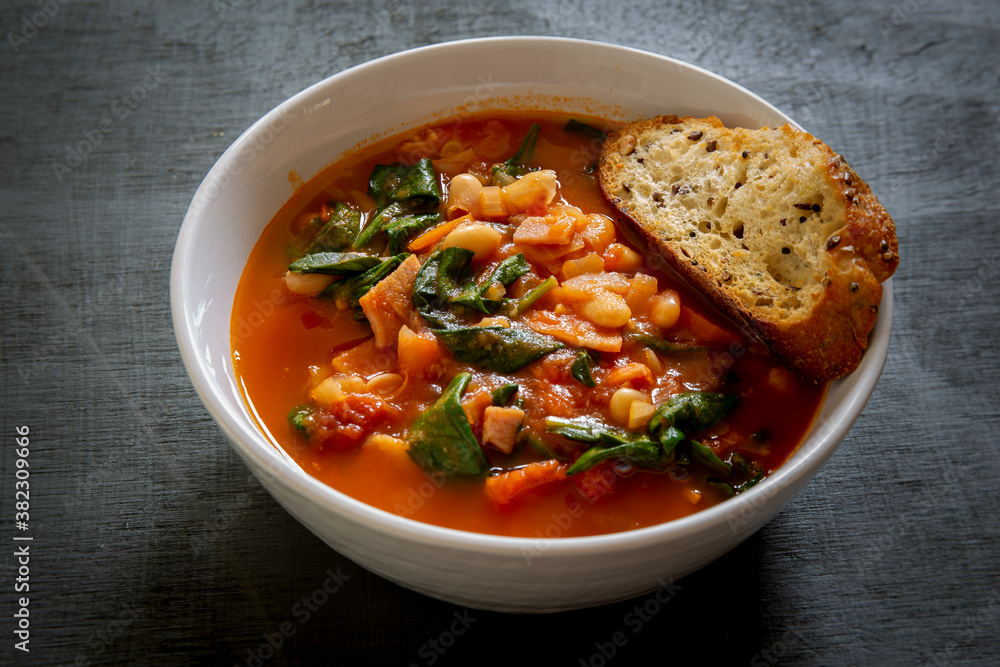 Homemade Ribollita, tuscan bean soup with seed & grains sourdough