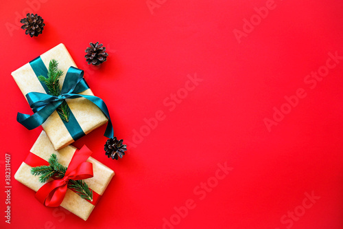 christmas gift boxes on red background © Gita