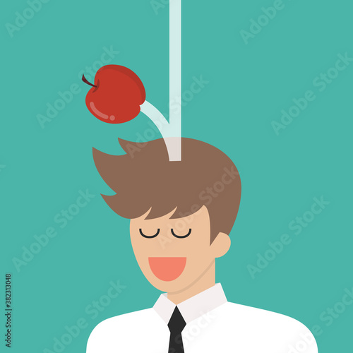 Apple falling dawn to the businessman head