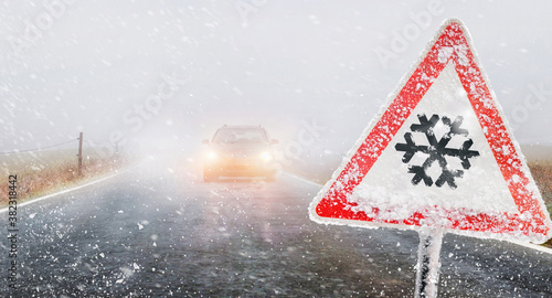 Photography first snow, road in the fog by car in the evening