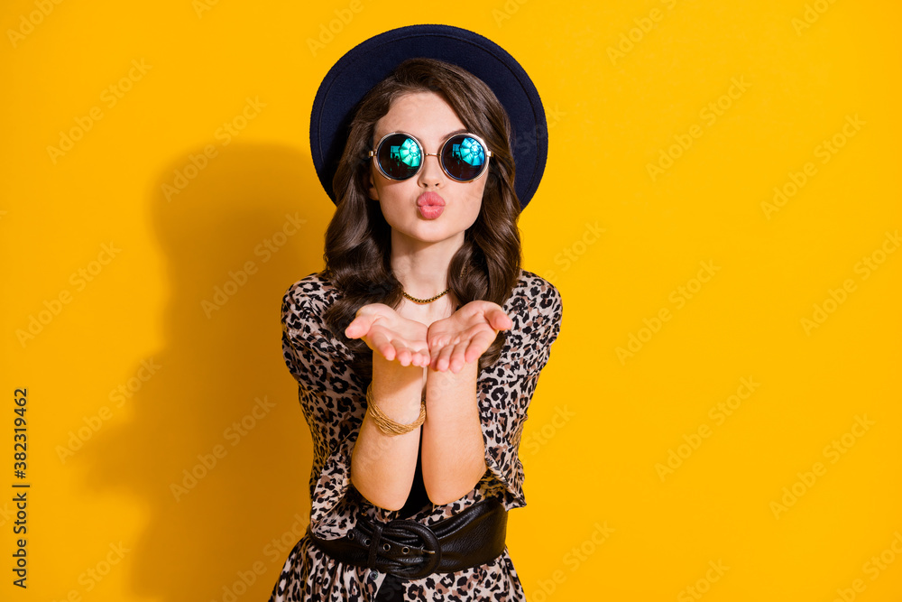 Portrait of charming pretty retro girl hold hand send air kiss boyfriend wear good look outfit hat sunglass isolated over bright shine color background Portrait of charming pretty retro girl hold hand send air kiss boyfriend wear good look outfit hat sunglass isolated over bright shine color background