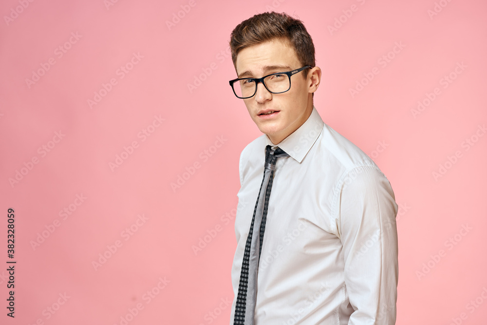 Business man in white shirt with tie wearing glasses self-confidence official pink background Business man in white shirt with tie wearing glasses self-confidence official pink background