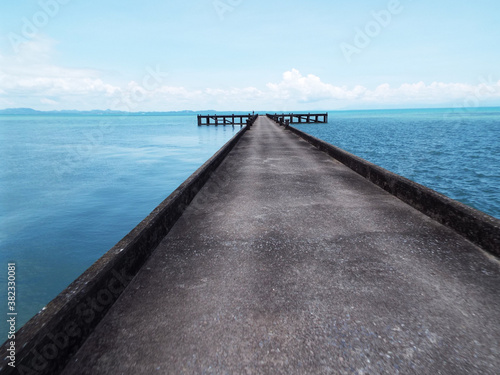 A pier juts out into the sea on Koh Chang Island. Thailand