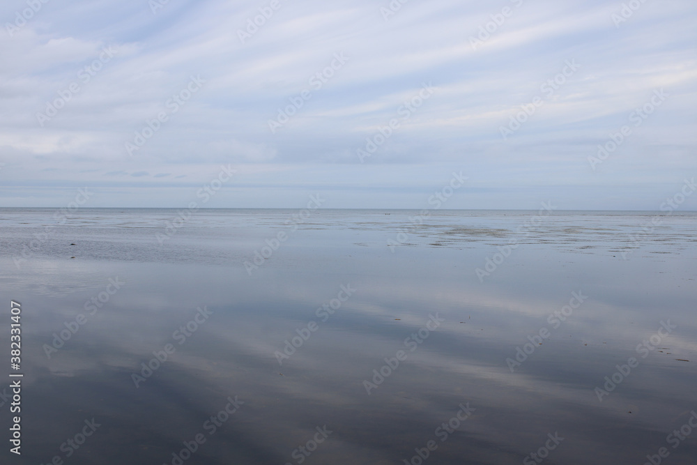 Clouds reflected on the surface of the sea