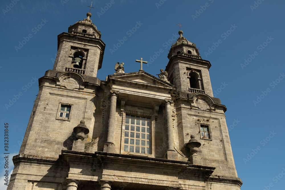 front view of San Francisco convent in Santiago de Compostela, baroque and neo classic architecture example with clear blue sky