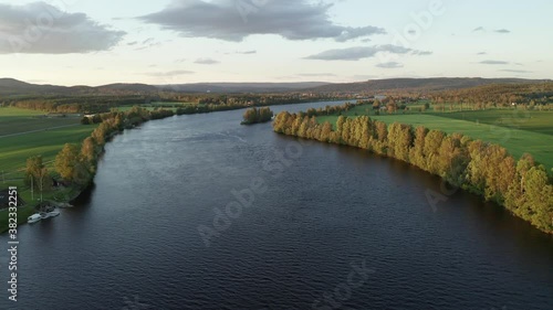 Wallpaper Mural Norwegian natural landscape in summer. Sunset beautiful light over red house or farm, river and forest. Typical Norway countryside aerial drone view. Close to Oslo capital Torontodigital.ca