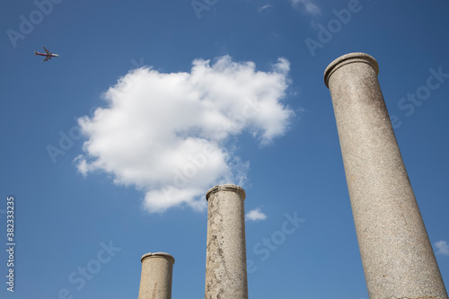 ancient Greek column ruins and blue sky
