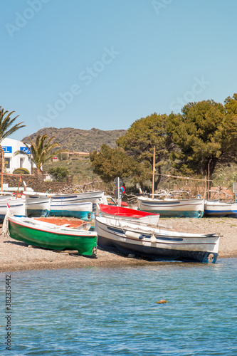 Small traditional fishing boats on the beach after a day's work © Ferran