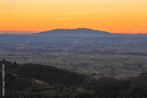 A view over the Waikato Region, New Zealand, at sunset, taken from the Kaimai Mountains. On the horizon is Maungatautari, or Sanctuary Mountain