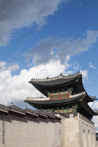 Gyeongbokgung palace landmark of Seoul, South Korea. roof with sky and cloud. © bong