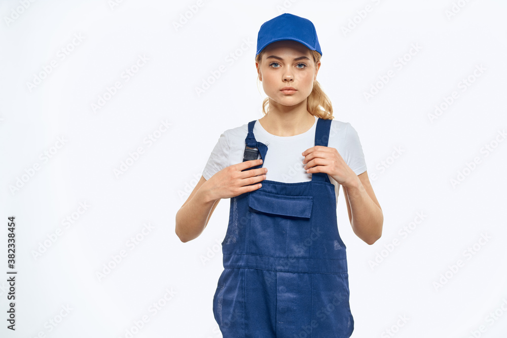 Woman in working uniform blue cap delivery courier delivery service Woman in working uniform blue cap delivery courier delivery service