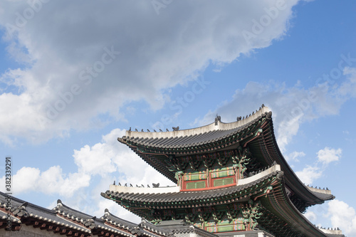 Gyeongbokgung palace landmark of Seoul, South Korea. roof with sky and cloud. © bong