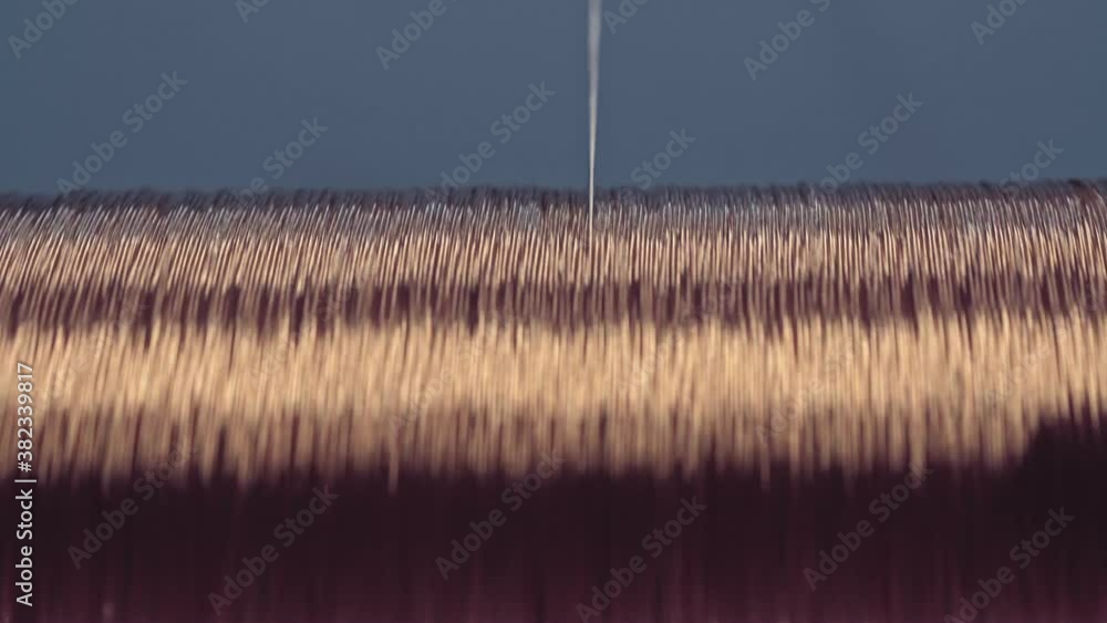 Copper cable manufacturing process. Copper cable spool rotation Stock ...